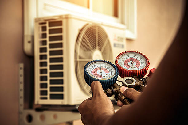 Professional Ac Installation technician working in Claypool, AZ